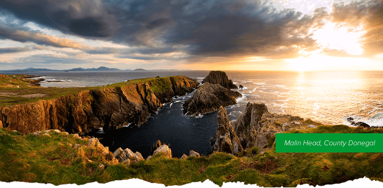 Malin Head, County Donegal - A sunset with cliffs overlooking the ocean.